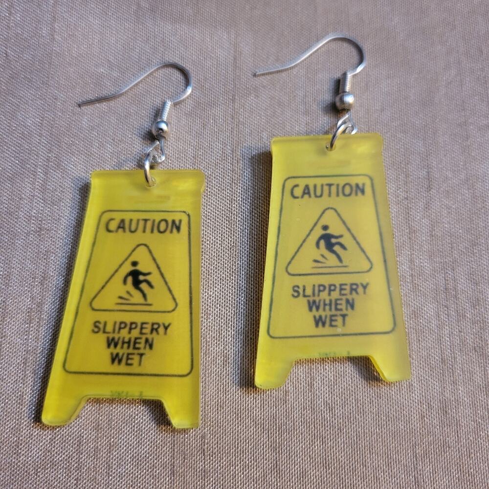 Slippery when wet yellow acrylic road sign hook earrings